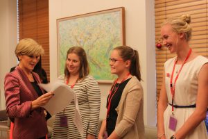 Foreign Minister Julie Bishop reading the winning entries of the 2014 Country to Canberra essay competition.